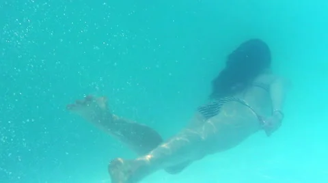 Girl floating in the pool. Video stock 50967185