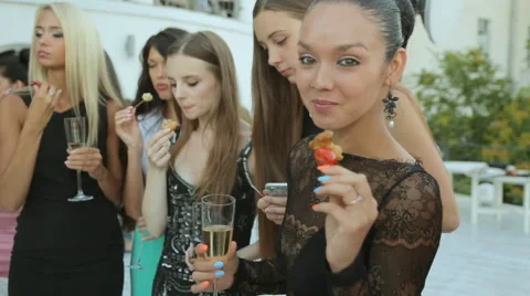 Girl fooling around at a banquet Stock Footage 59658626