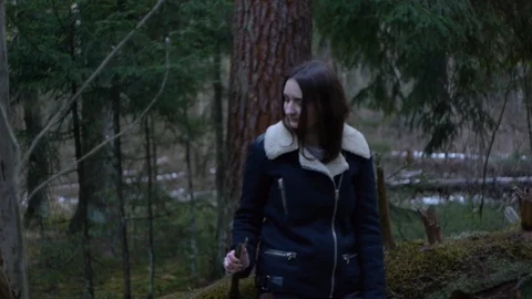 Girl in the forest, fallen tree Stock Footage 123148089