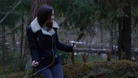 Girl in the forest, fallen tree Stock Footage 123148106