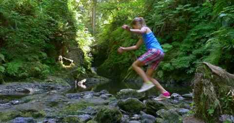 Girl at forest waterfall. Video stock 45433086