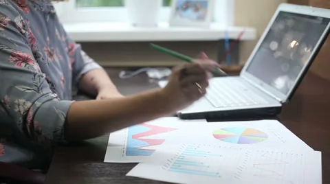 The girl the freelancer is working on the computer at home Stock Footage 65290046