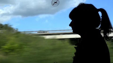 Girl in front of a train window 2 Stock Footage 41479704