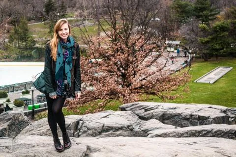 Girl in front of trees at the Central Park in Manhattan, New York City Stock Photos