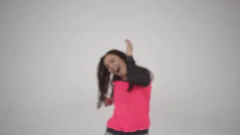 The girl is fun dancing on a white background. Video stock 73484741
