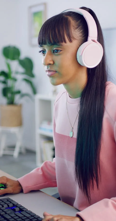 Girl, gaming and computer with tech for streamer, esports and online hobby in Stock Footage 335111287