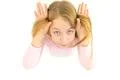 The girl gesture to the camera. View from above Photo