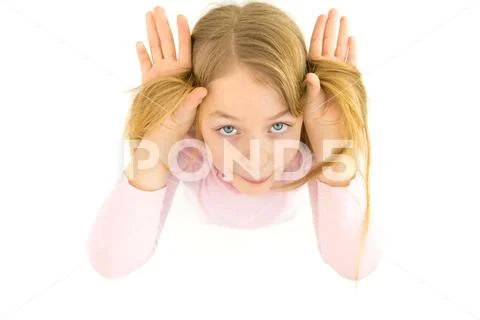 The girl gesture to the camera. View from above Stock Photos