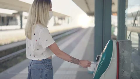 Girl gets an automatic ticket at the machine at the railway station. Stock Footage 154096426