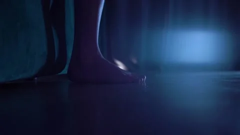 The girl gets off the couch Stock Footage 157022126