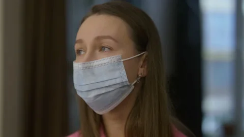 Girl gets flowers while been quarantined, she is sad that can not go on a date Stock Footage 149924339