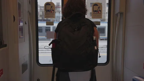 Girl gets off train. Stock Footage 133456671