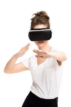 Girl getting experience using VR glasses of virtual reality 写真素材