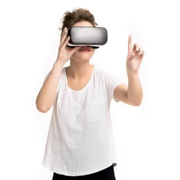 Girl getting experience using VR glasses of virtual reality Fotos Stock