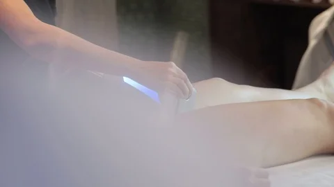 The girl is given an anti-cellulite procedure by the endosphere Stock Footage 120633944