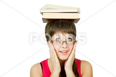 Girl in glasses with books on head Stock Photos