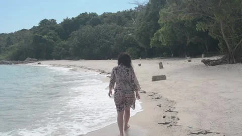 Girl goes on an empty Beach Stock Footage 86489170