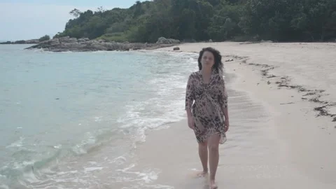 Girl goes on an empty Beach Stock Footage 86490347