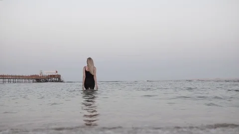  Girl goes to sea Stock Footage