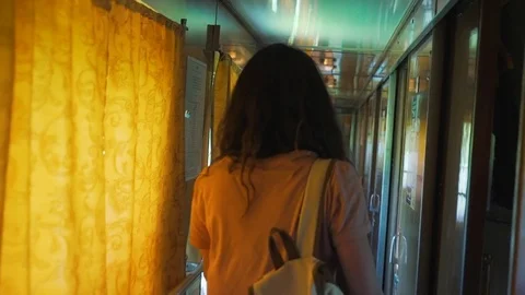 Girl is going in the wagon of train Stock Footage 76249922