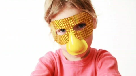 Girl in gold mask with nose Stock Footage