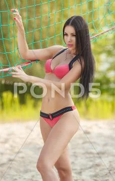 Girl in good shape with long dark hair Stock Photos