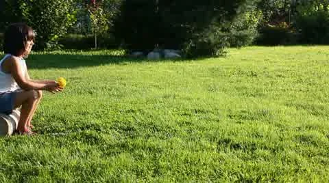 Girl on grass Stock Footage