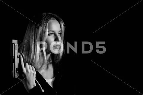 Girl with gun Stock Photos