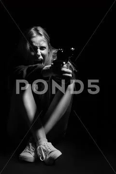 Girl with gun Stock Photos