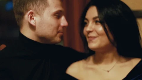 Girl with a guy talking in a cafe Stock Footage 104144404