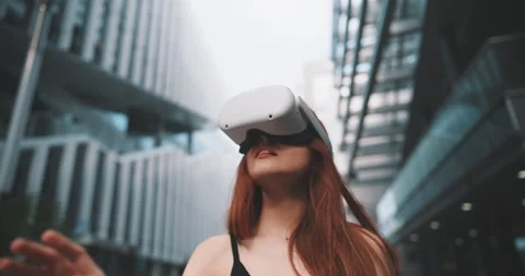 Girl hand moving while she is experiencing vr glasses Stock Footage 201679307