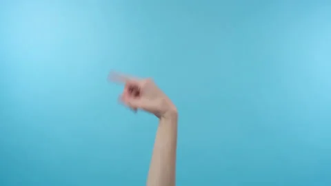 The girl hand points to the left side Stock Footage 171909948