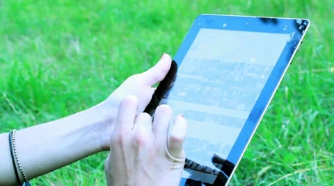 GIRL HANDS USING TABLET Stock Footage 40541619