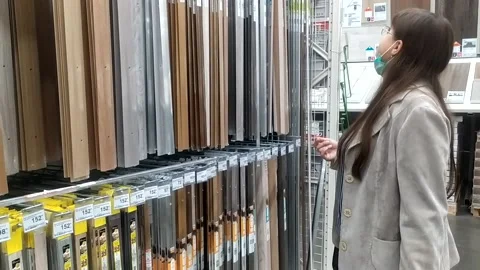 Girl at the hardware store Video stock 137655934