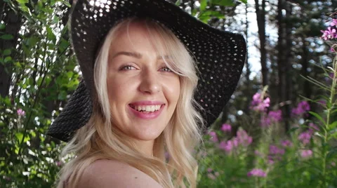 Girl with hat looking at the camera Video stock 53706270
