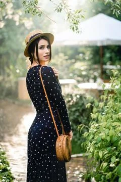 Girl in hat posing on camera Stock Photos