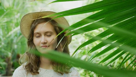 Girl with a hat smiling Stock Footage 99965403