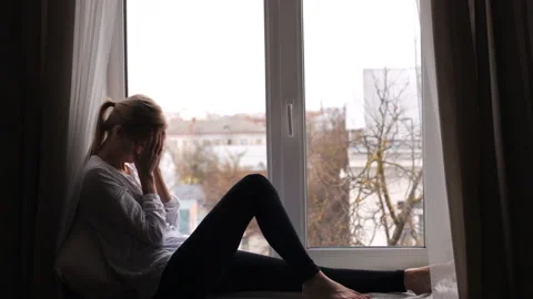 Girl with a headache is sitting Stock Footage 101320049