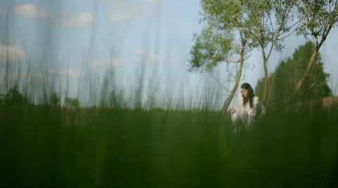 Girl in high grass Stock Footage 48021077