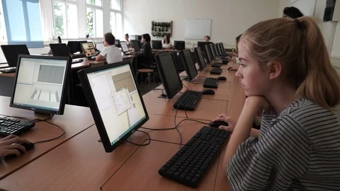 Girl in High School computer Class Stock Footage
