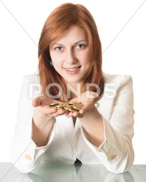 Girl holds in her hands the gold coins Stock Photos