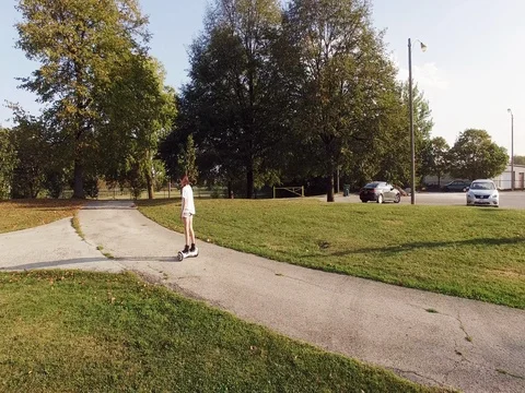 Girl on Hover board Stock Footage 80353208