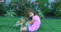 Girl Hugging Dog and Smiling HD Footage