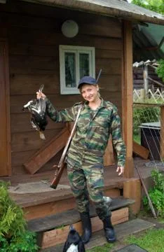 Girl-hunter. Stock Photos