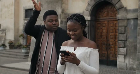 Girl ignoring boyfriend while using smarthone. Stock Footage 121252162