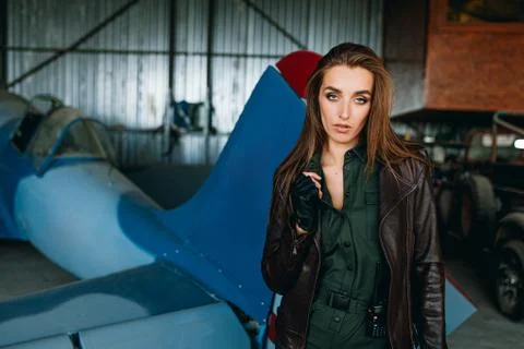 Girl in the image of a pilot Stock Photos