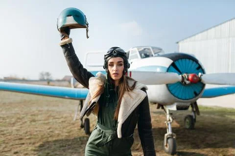 Girl in the image of a pilot Stock Photos
