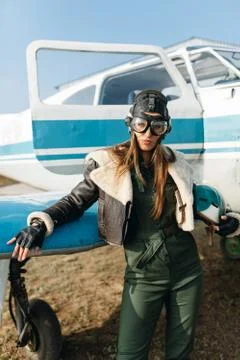 Girl in the image of a pilot Stock Photos