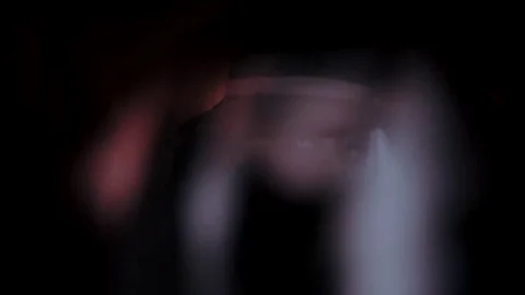 Girl in the image of a witch hat. Black background 库存影片 69242857