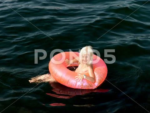 Girl On Inflatable Ring